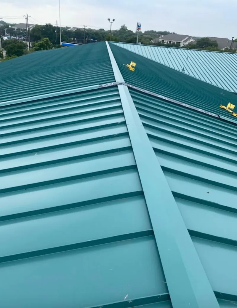 Green commercial metal roof ridge and valley for Metal Roof Repair in Sterling